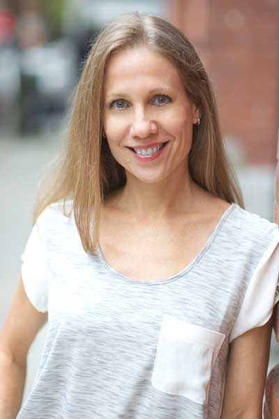 Laurie standing outside the Majestic Theater